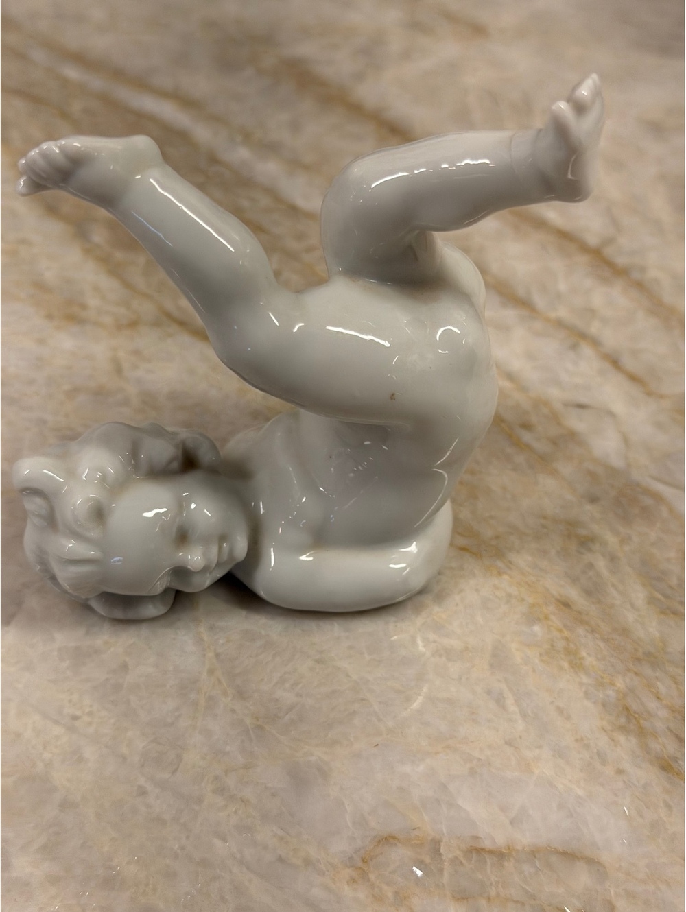 Vintage Porcelain Tumbling Cherub Figurine